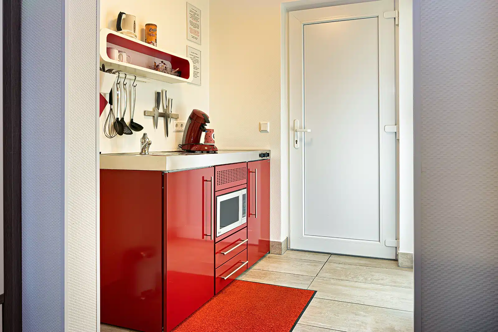 Die Küche im Doppelzimmer Haus Marius